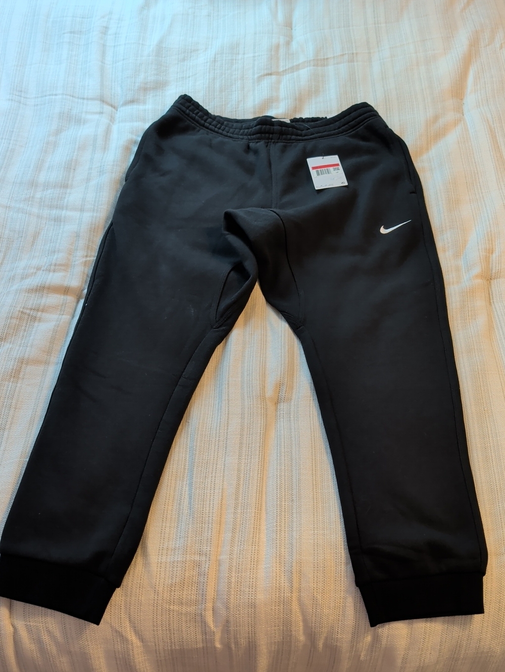 Nike Men's Black Jogger Sweatpants with White Swoosh
